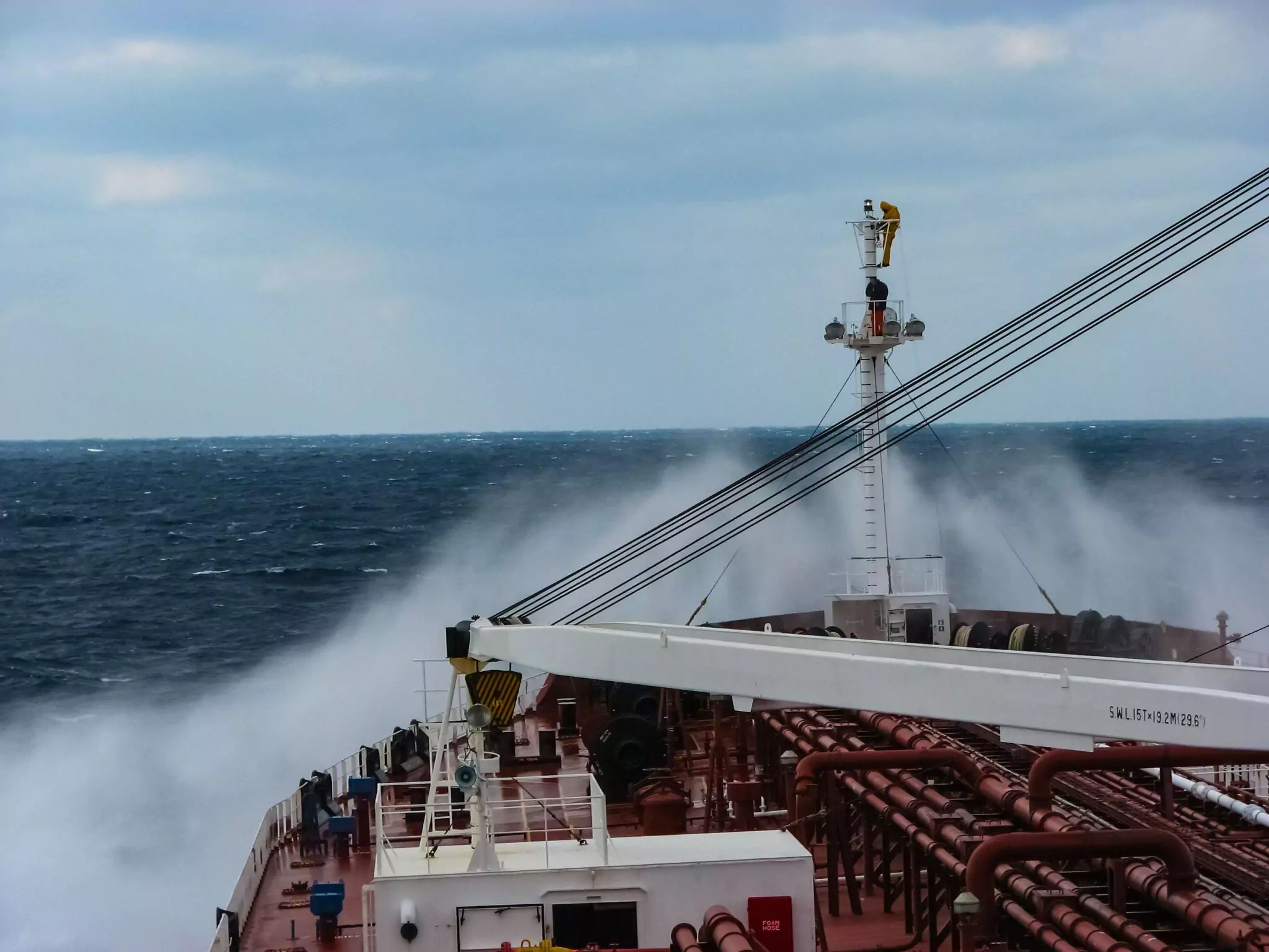 tanker plunges into the big splash of waves